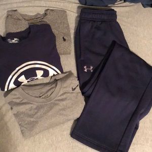 Assorted men’s size S tees and pants
